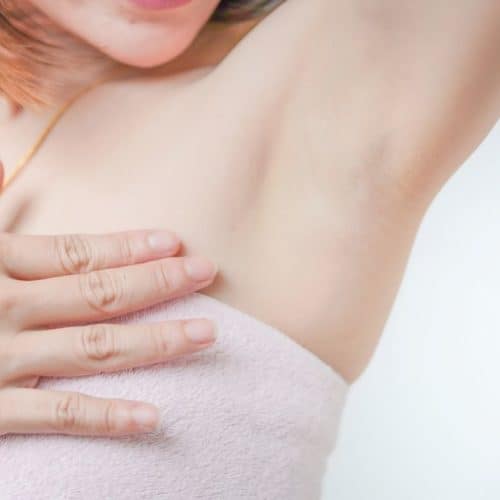 Woman checking her underarms | Mark Medical Care